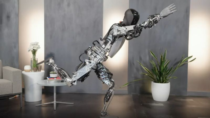 Tesla показва роботи Optimus, които сортират предмети и изпълняват йога упражнения, докато стоят на един крак 